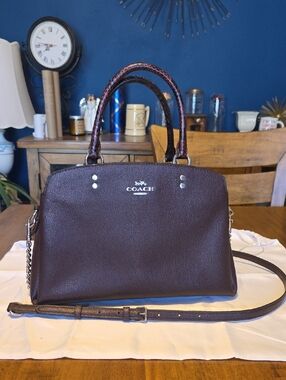 Coach Lillie Carryall in a deep burgundy with python-embossed